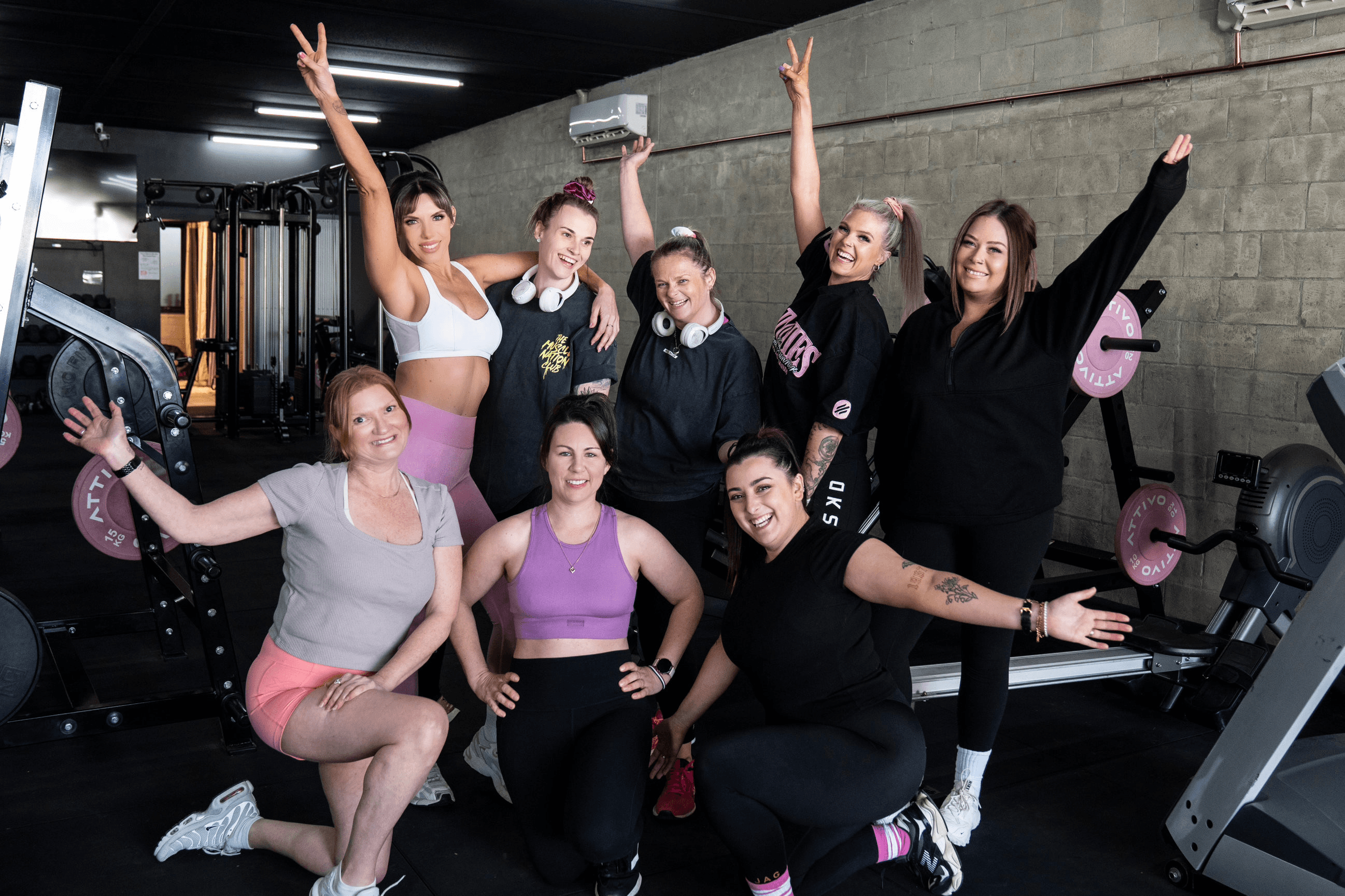 Happy community of women at the gym
